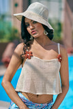 Turn heads in this sky-blue bikini scarf and white crop top set from NovelaFashion. Inspired by Missoni, it’s the perfect beach club or resort outfit—available in sizes XXS to 5XL.